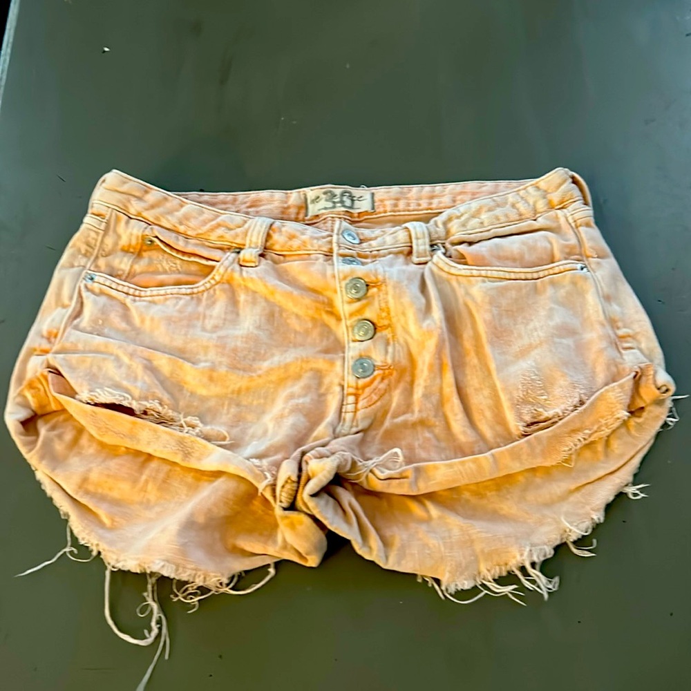 We The Free light coral button fly shorts. Size 30. (Free People)